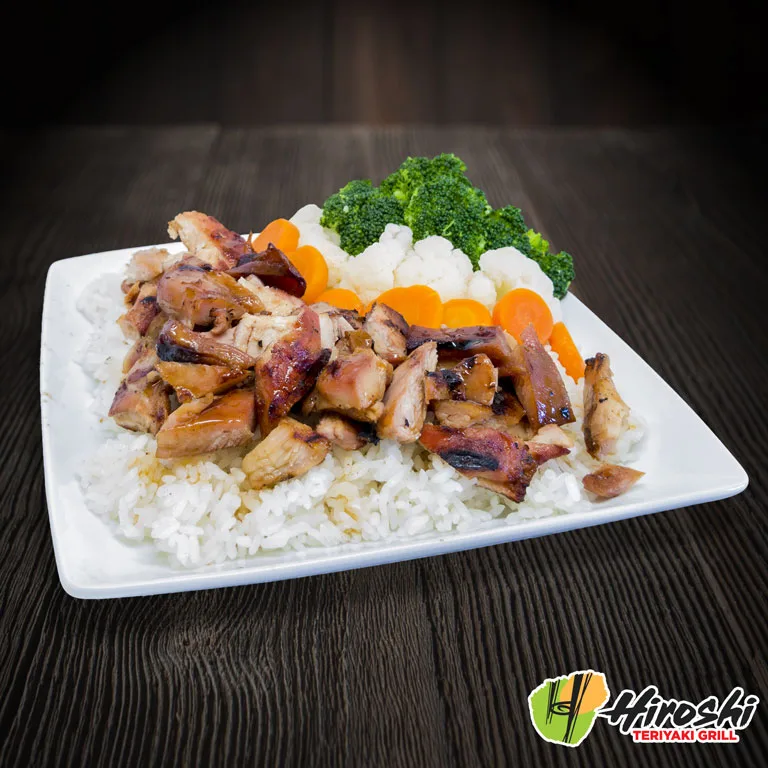 Grilled teriyaki chicken over rice with broccoli, cauliflower and carrots at Hiroshi.